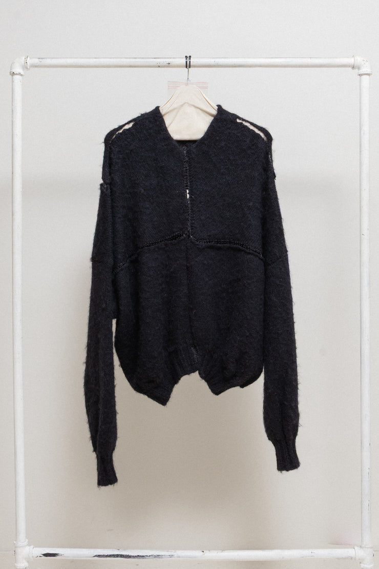 FREDERIK LIEDERLEY - Wool sweater with extra long sleeves and loose knitting details