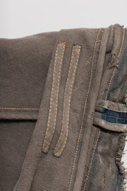 RICK OWENS DRKSHDW - 2007 Washed denim jacket with long sides, rounded panels and raw cut edges