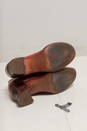 CHEREVICHKIOTVICHKI - Blood red leather pumps with curved heels