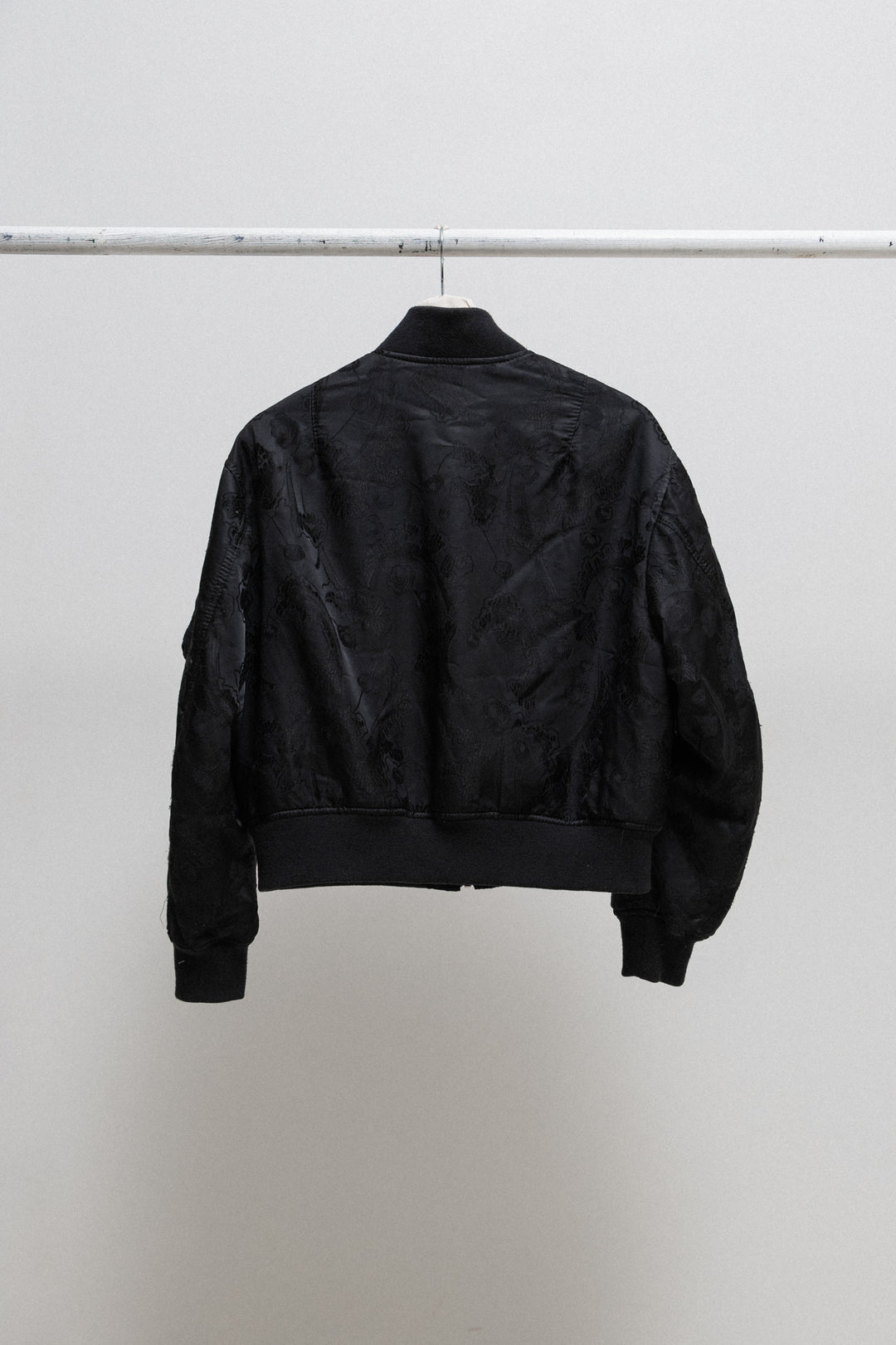 NOIR KEI NINOMIYA - FW17 Padded bomber jacket with floral