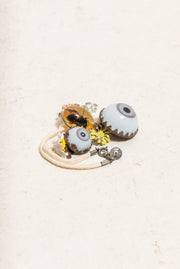 UNDERCOVER - SS05 « But Beautiful II » Glass monster eye ankle bracelet with bee in amber charm and metal flowers (runway)