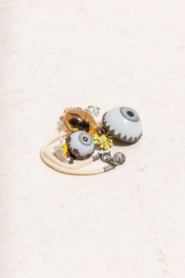 UNDERCOVER - SS05 « But Beautiful II » Glass monster eye ankle bracelet with bee in amber charm and metal flowers (runway)