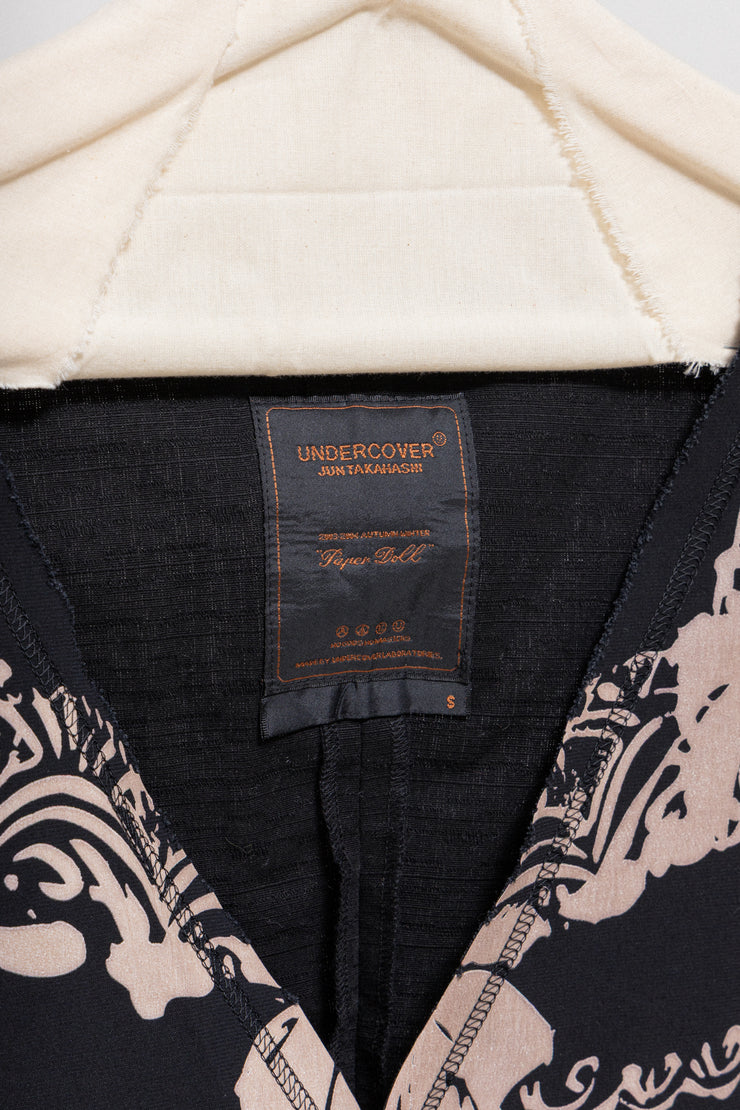 UNDERCOVER - FW03 "Paper Doll" Printed wool vest with snap buttons