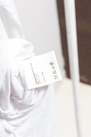 UNDERCOVER - SS06 « T. » White slashed top with front straps (runway)