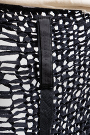 ALEKSANDR MANAMIS - Loose knitted cardigan with falling straps