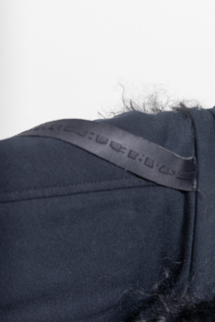 GARETH PUGH - Waxed cotton jacket with mongolian fur collar and front straps