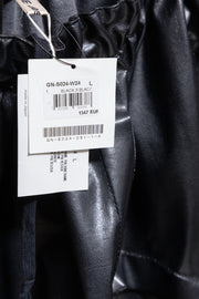 COMME DES GARÇONS - 2024 Faux leather skirt with volumes and cutouts showing off sheer underlayer