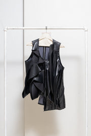 COMME DES GARÇONS - 2024 Faux leather top with voluminous front frills
