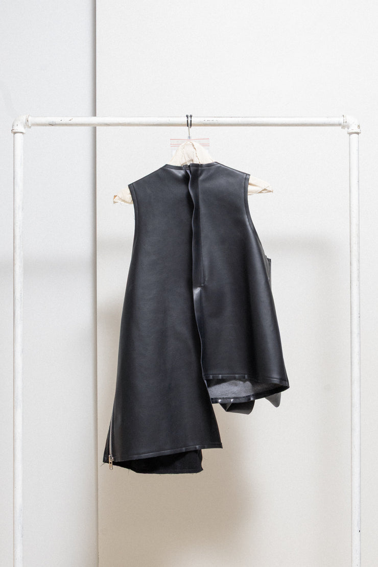 COMME DES GARÇONS - 2024 Faux leather top with voluminous front frills