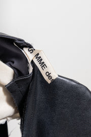 COMME DES GARÇONS - 2024 Faux leather top with voluminous front frills