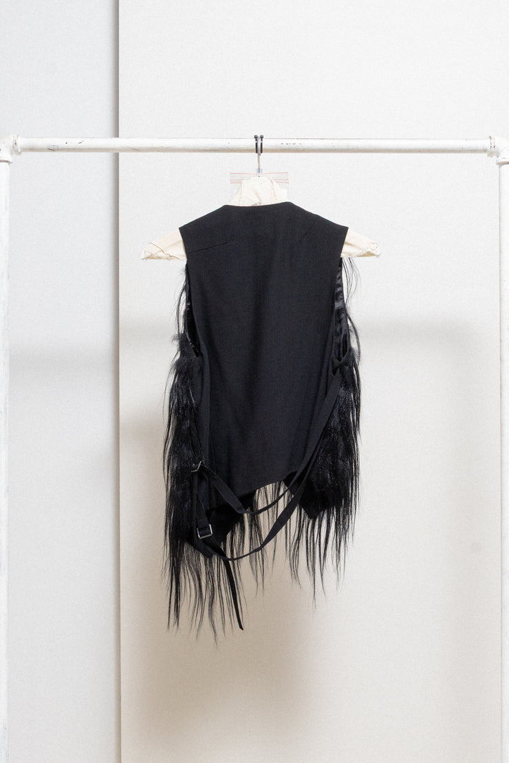 ANN DEMEULEMEESTER - Wool vest with long fur attached to front leather straps
