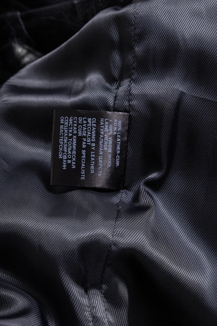 ANN DEMEULEMEESTER - Wool vest with long fur attached to front leather straps