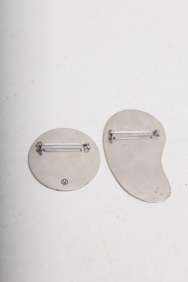 UNDERCOVER - Spring 2004 « Languid » Set of two metallic badges