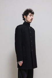 YOHJI YAMAMOTO POUR HOMME - FW07 Officer wool coat with back buttoning creating a slit (runway)