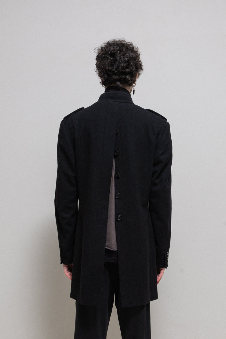 YOHJI YAMAMOTO POUR HOMME - FW07 Officer wool coat with back buttoning creating a slit (runway)