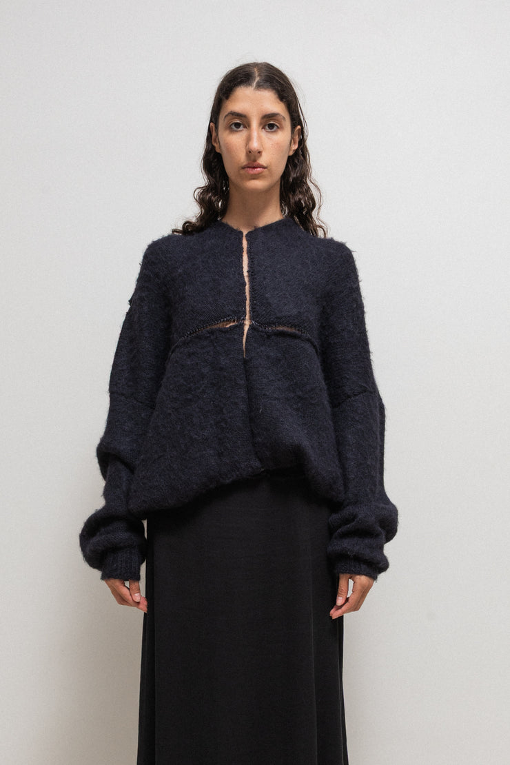 FREDERIK LIEDERLEY - Wool sweater with extra long sleeves and loose knitting details