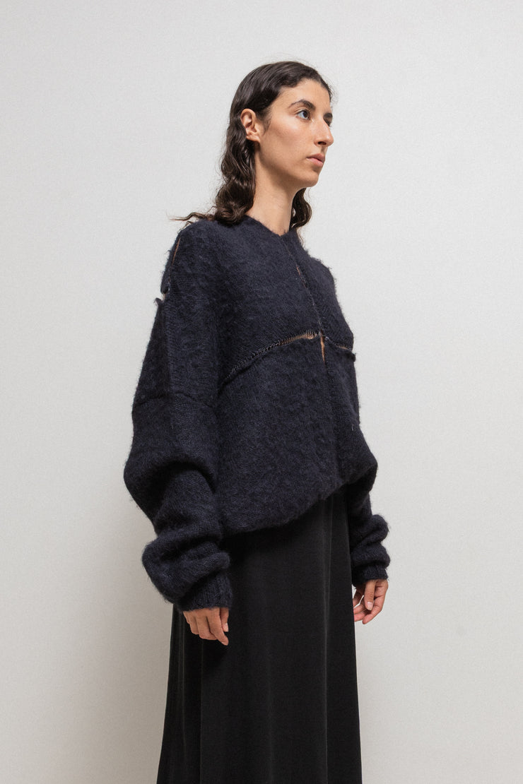 FREDERIK LIEDERLEY - Wool sweater with extra long sleeves and loose knitting details