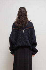 FREDERIK LIEDERLEY - Wool sweater with extra long sleeves and loose knitting details