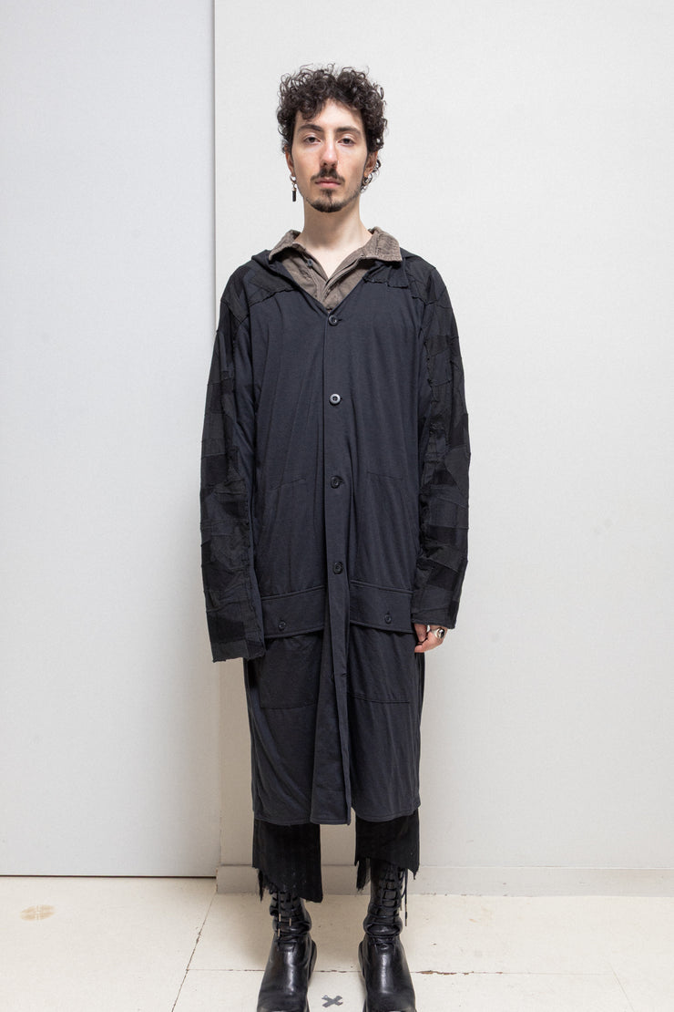 BLACKMEANS - Extra long cotton jacket with patchwork sleeves and hood