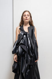 COMME DES GARÇONS - 2024 Faux leather top with voluminous front frills