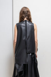 COMME DES GARÇONS - 2024 Faux leather top with voluminous front frills