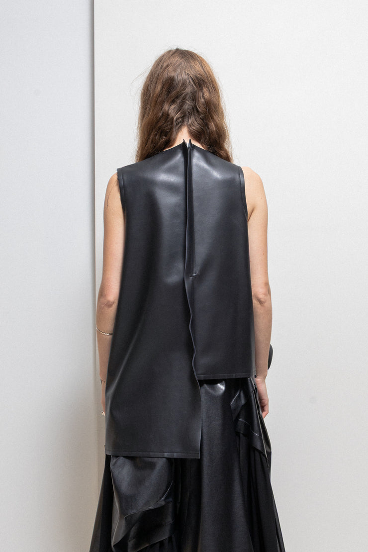 COMME DES GARÇONS - 2024 Faux leather top with voluminous front frills