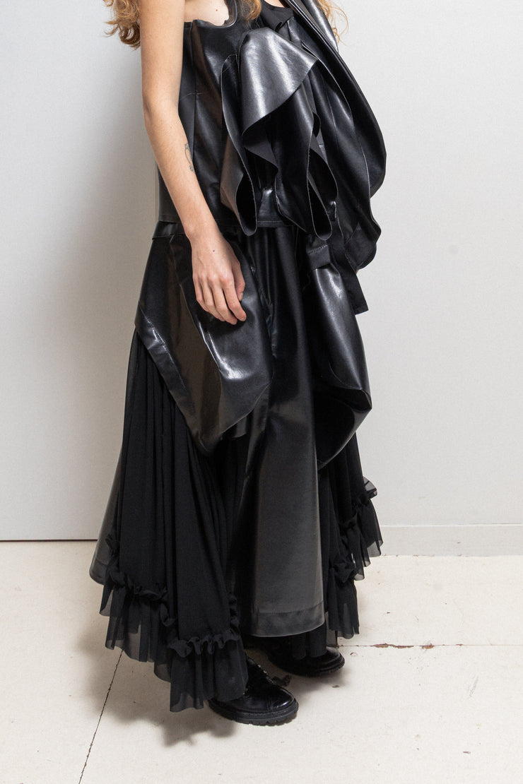 COMME DES GARÇONS - 2024 Faux leather skirt with volumes and cutouts showing off sheer underlayer