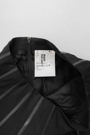 NOIR KEI NINOMIYA - FW17 Pleated skirt with faux leather straps